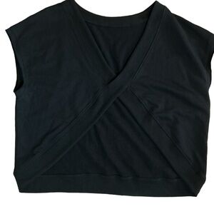 Cut the frills sleeveless black sweater
